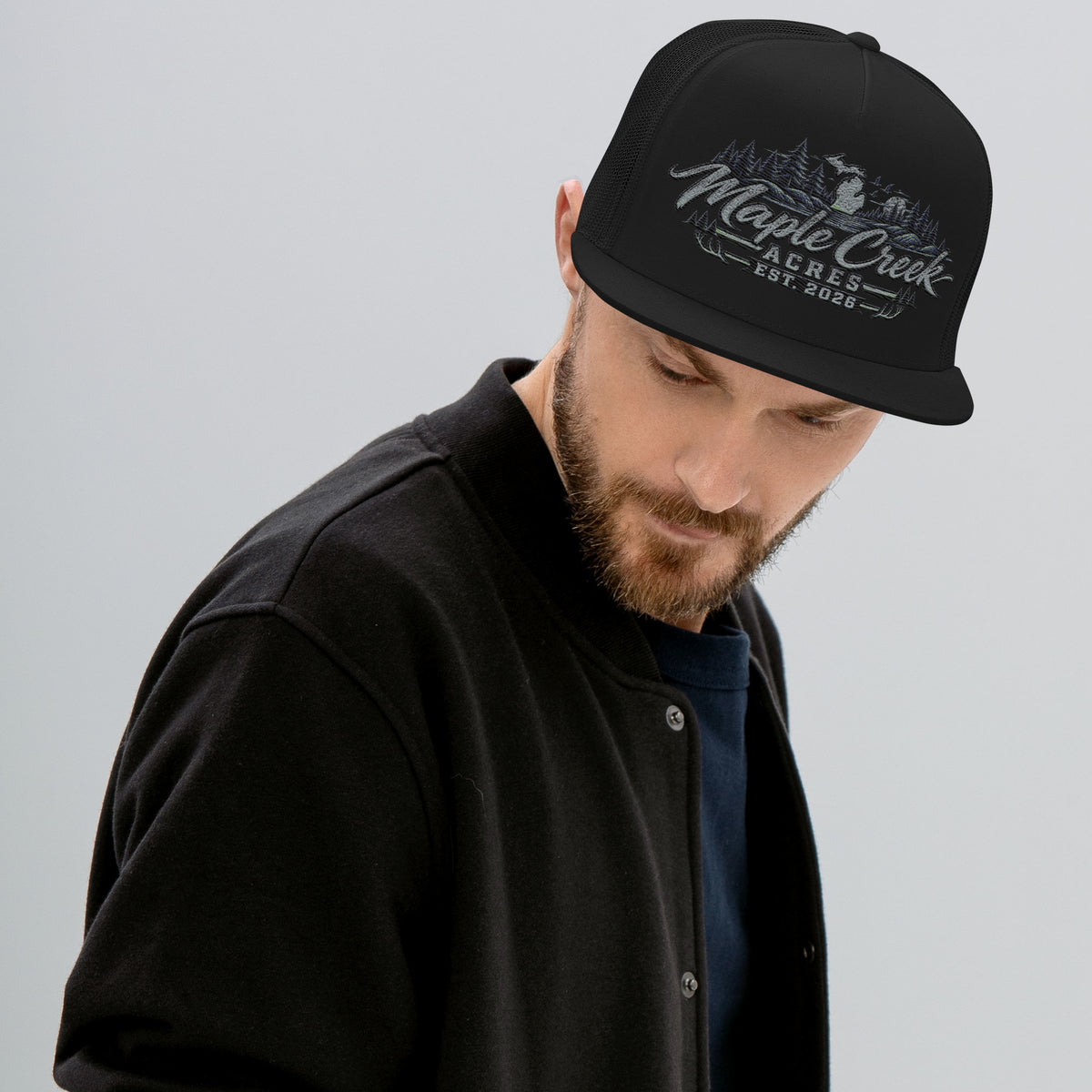 Maple Creek Acres Flat-Bill Trucker Cap in Black — front view