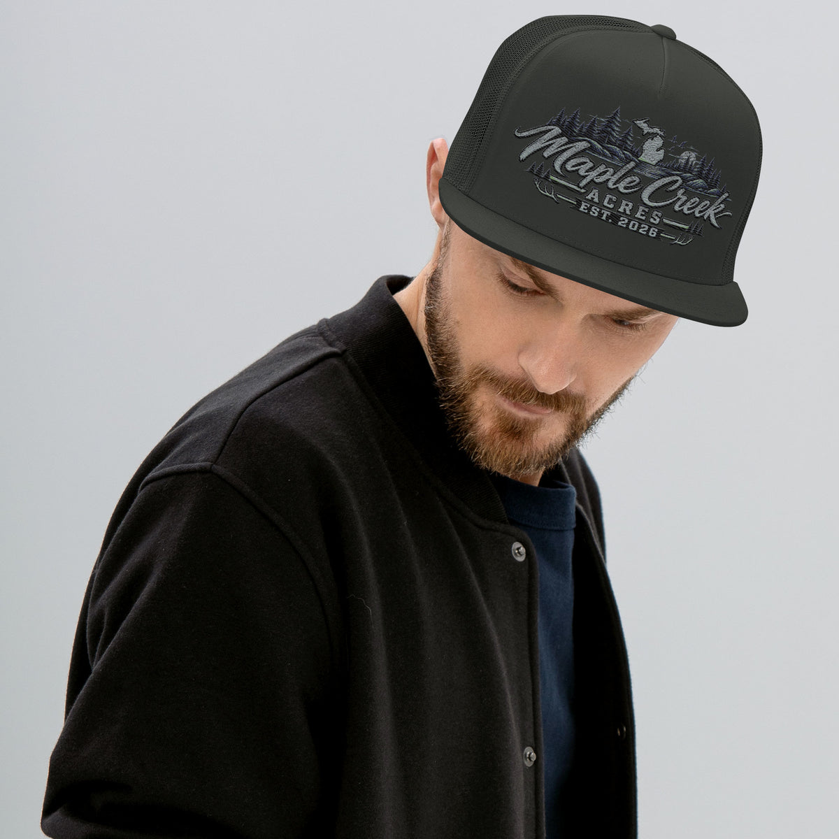 Maple Creek Acres Flat-Bill Trucker Cap in Charcoal — front view