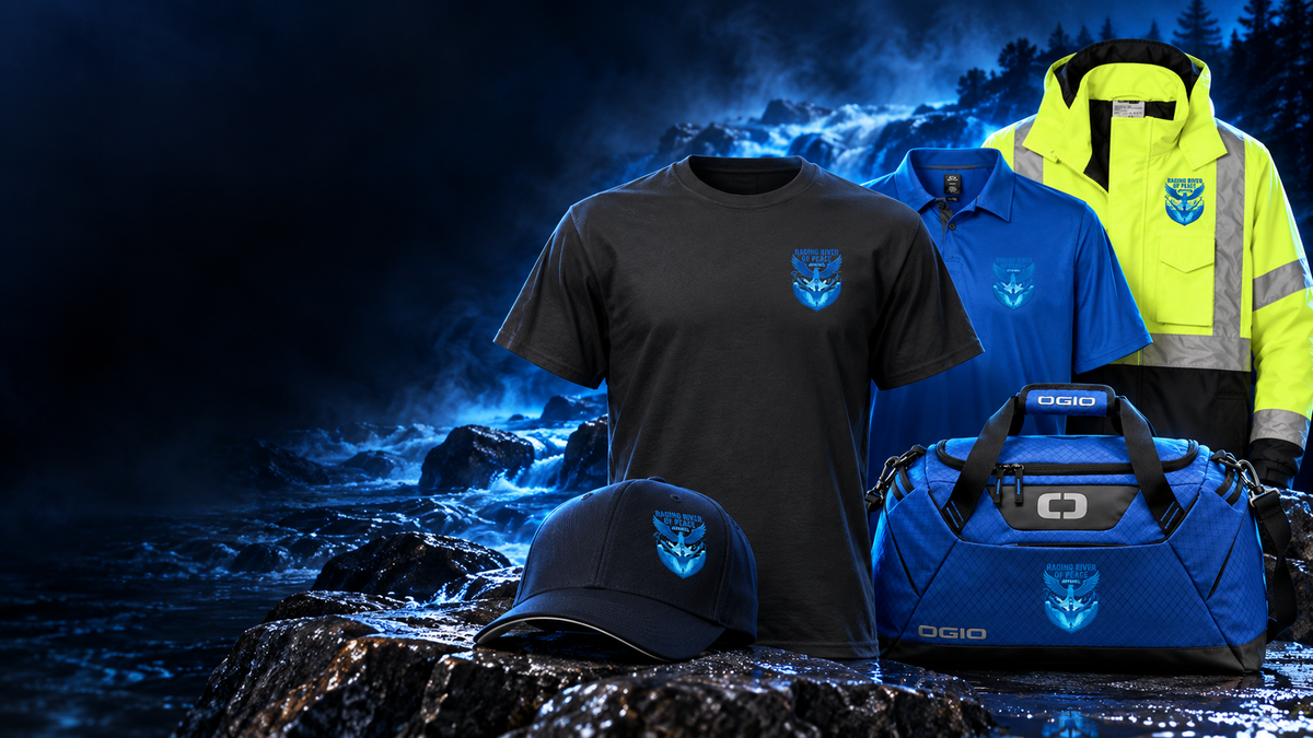 Raging River of Peace Apparel tee, embroidered cap, polo, duffel bag, and high-visibility work jacket displayed beside a blue river